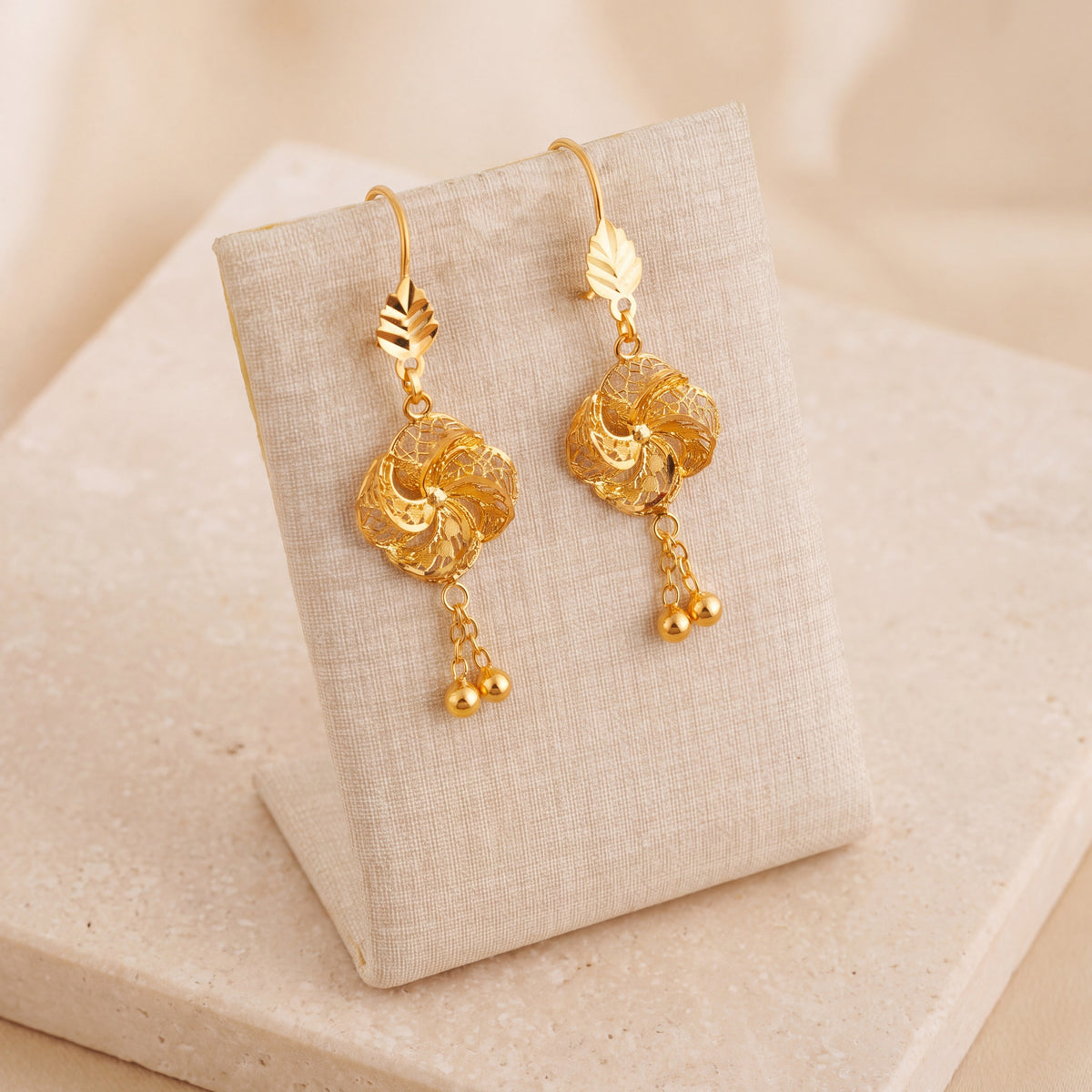 Casting Earrings (D68) on travertine