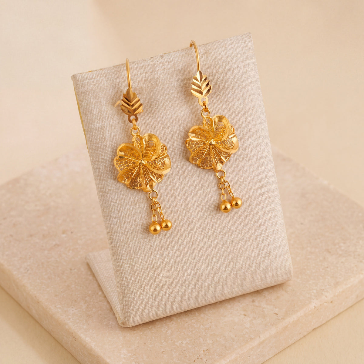 Casting Earrings (D69) on travertine