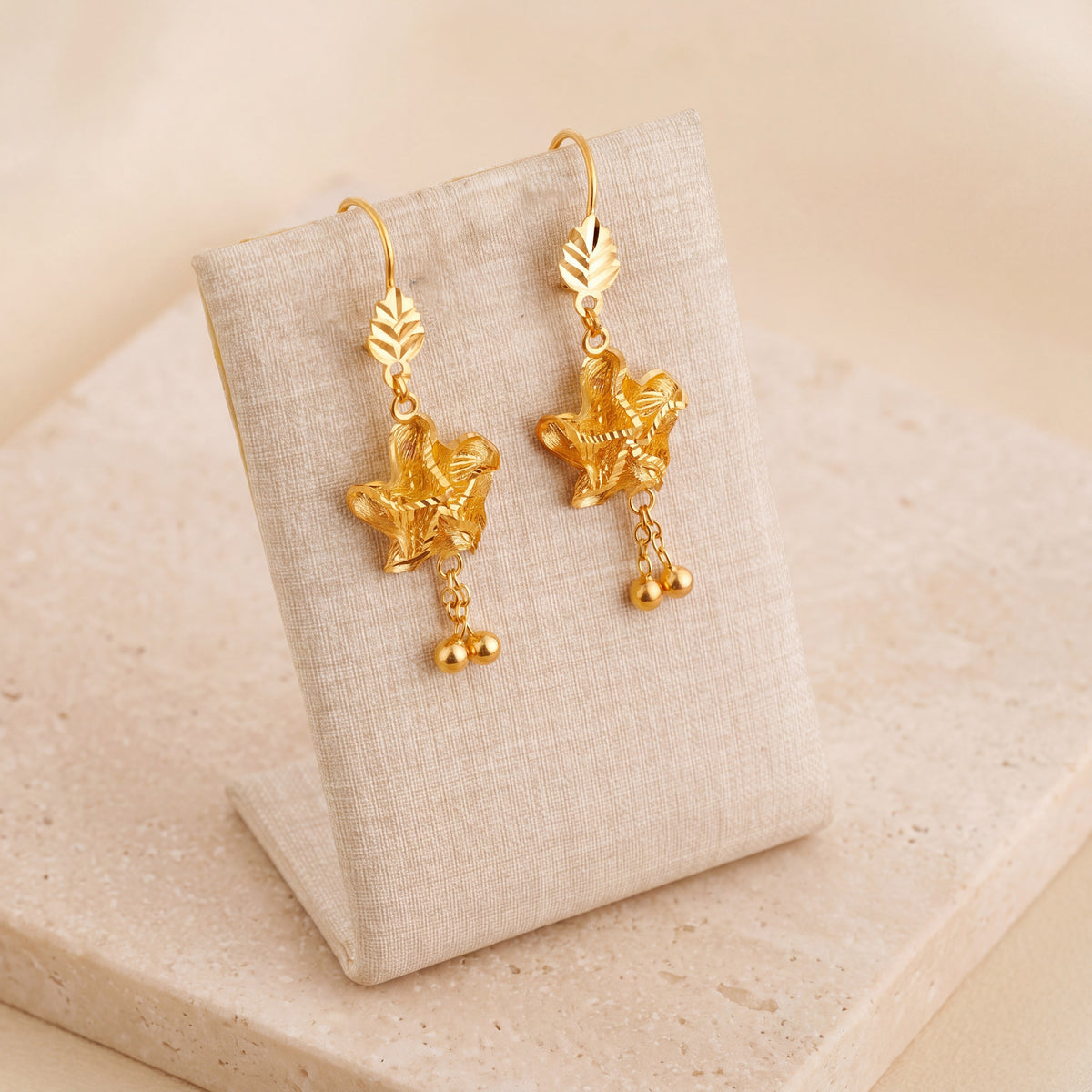 Casting Earrings (D72) on travertine