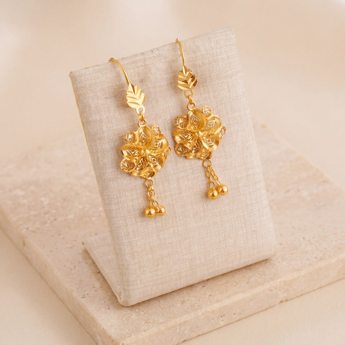 Casting Earrings (D73) on travertine