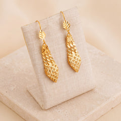 Casting Earrings (D75) on travertine