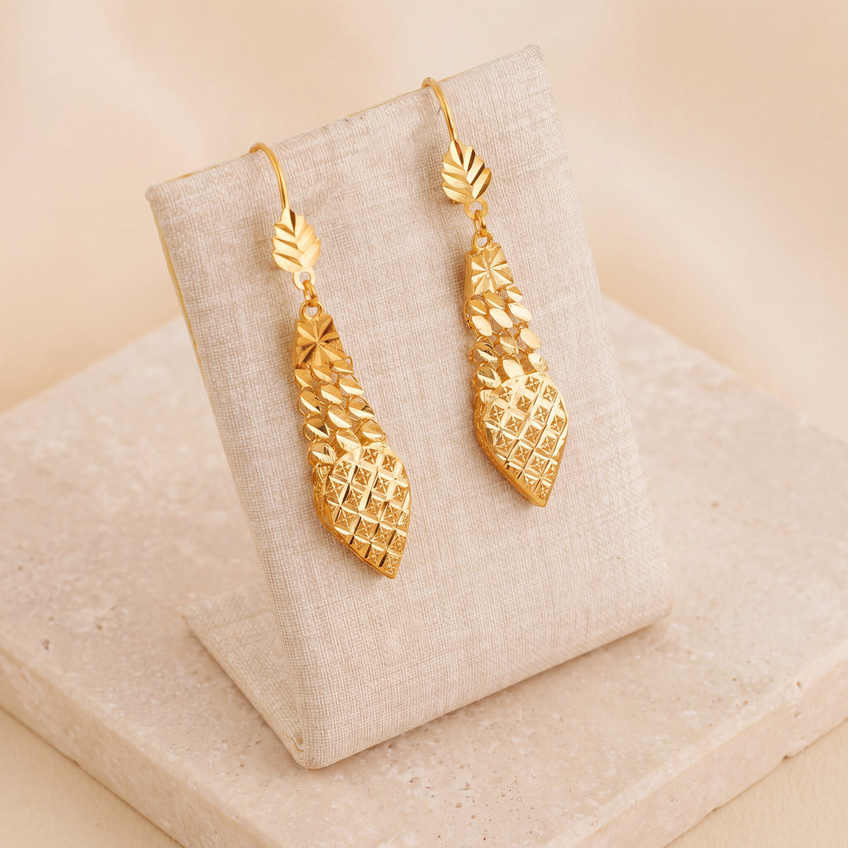 Casting Earrings (D75) on travertine