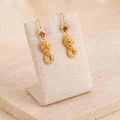 Casting Earrings (D79) on travertine