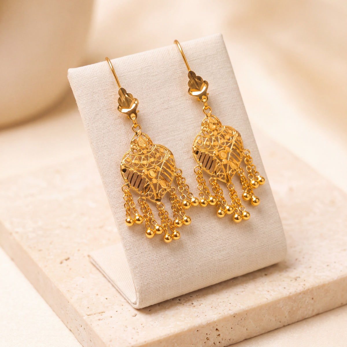 Casting Earrings (D8) on travertine