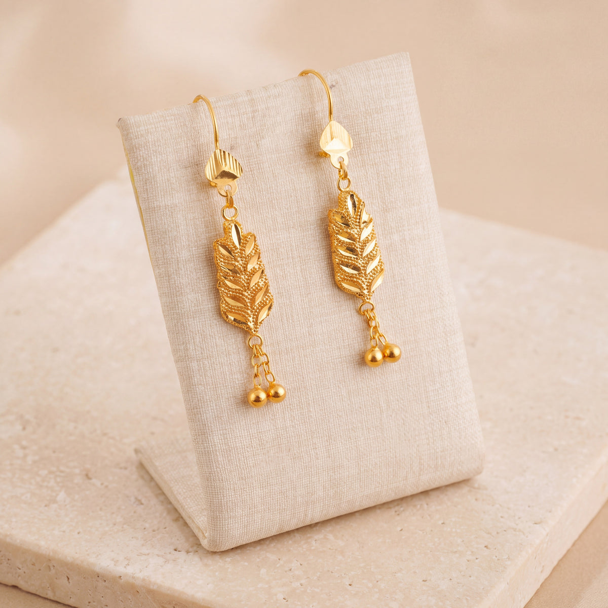Casting Earrings (D84) on travertine