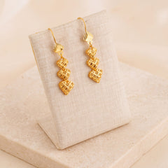 Casting Earrings (D86) on travertine