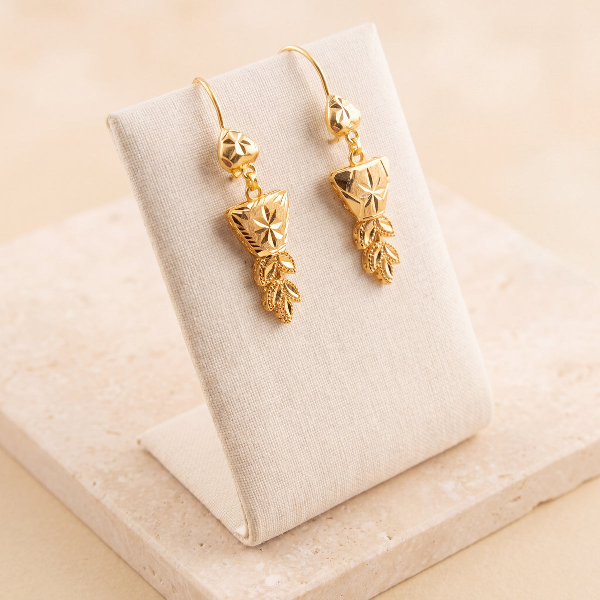 Casting Earrings (D90) on travertine