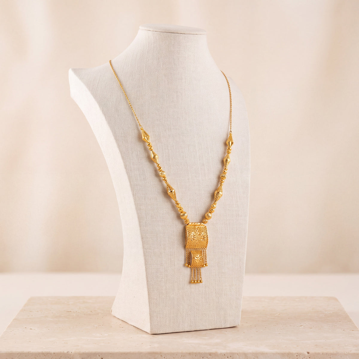 Casting Mala Necklace 18 on travertine