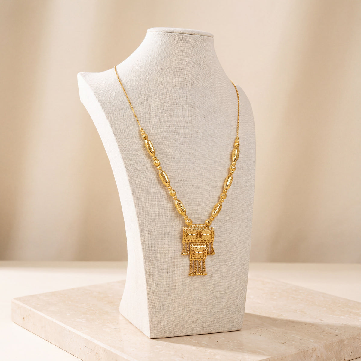 Casting Mala Necklace 25 on travertine