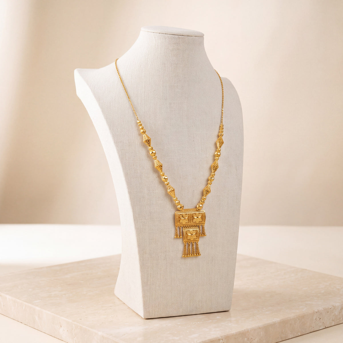 Casting Mala Necklace 26 on travertine
