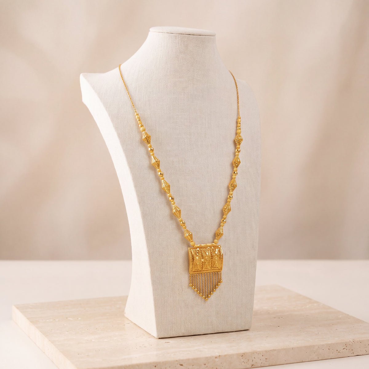 Casting Mala Necklace 27 on travertine