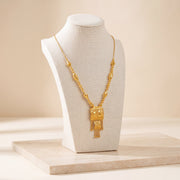 Casting Mala Necklace 28 on travertine