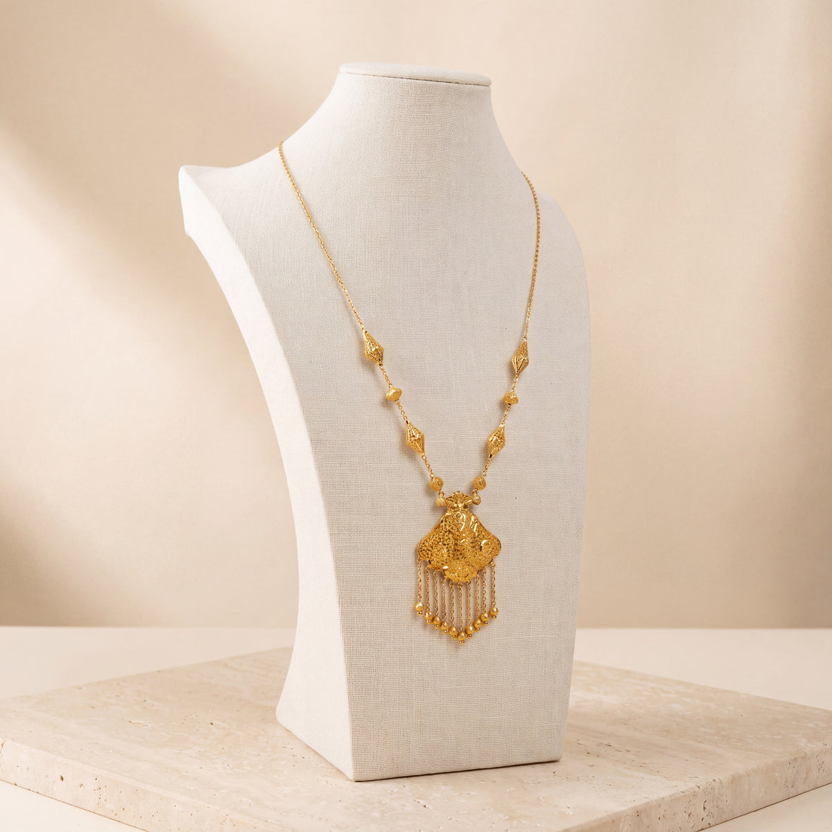 Casting Mala Necklace 30 on travertine