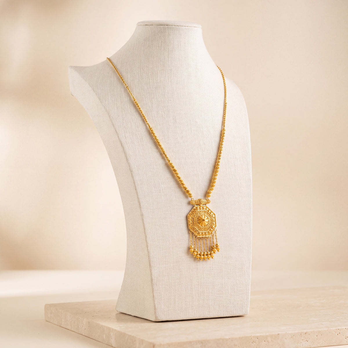 Casting Mala Necklace 55 on travertine