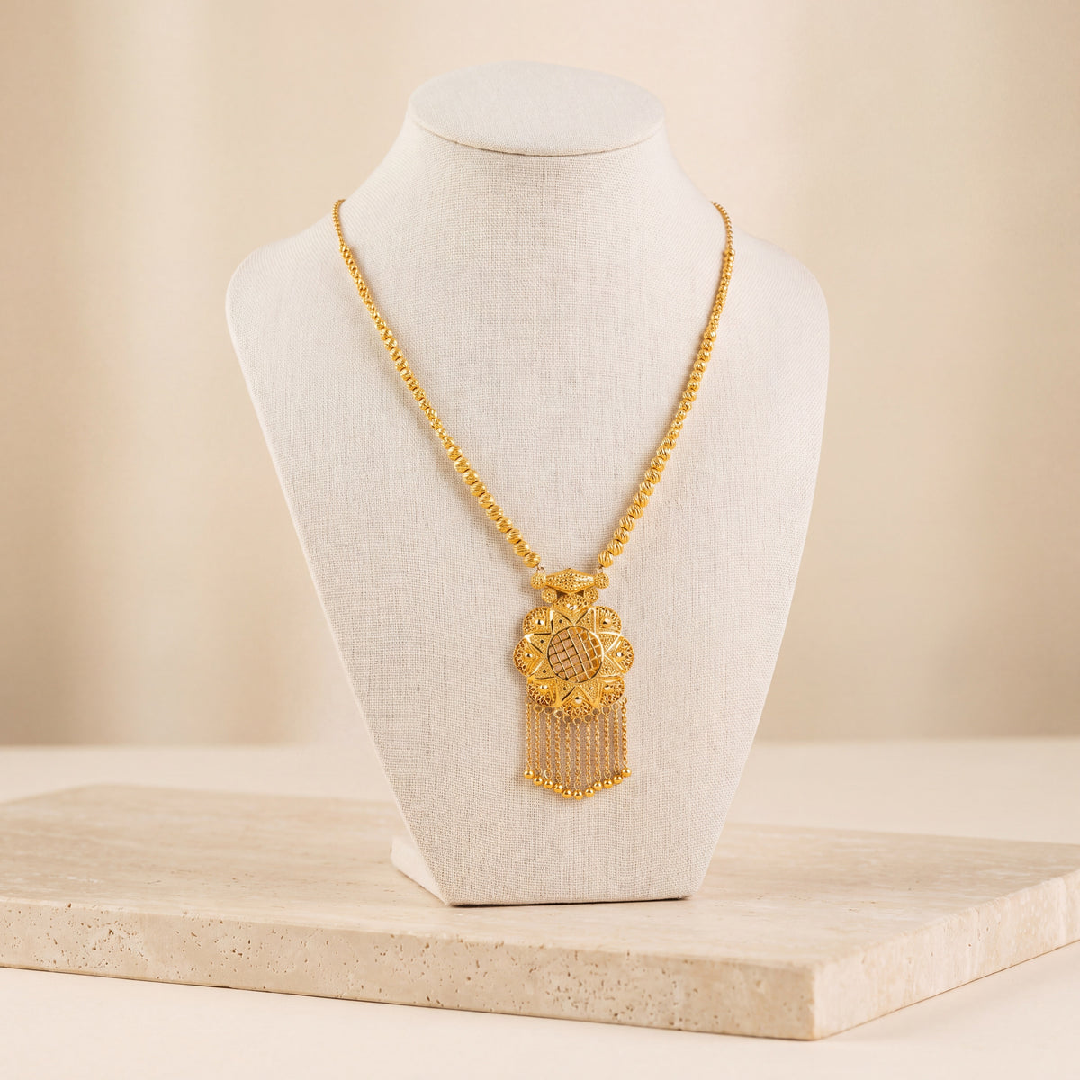 Casting Mala Necklace 60 on travertine