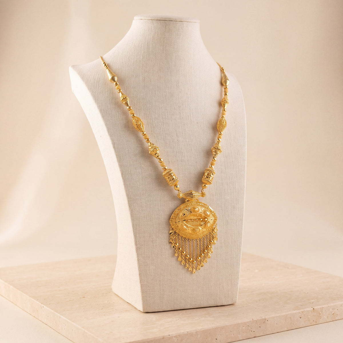 Casting Mala Necklace 62 on travertine
