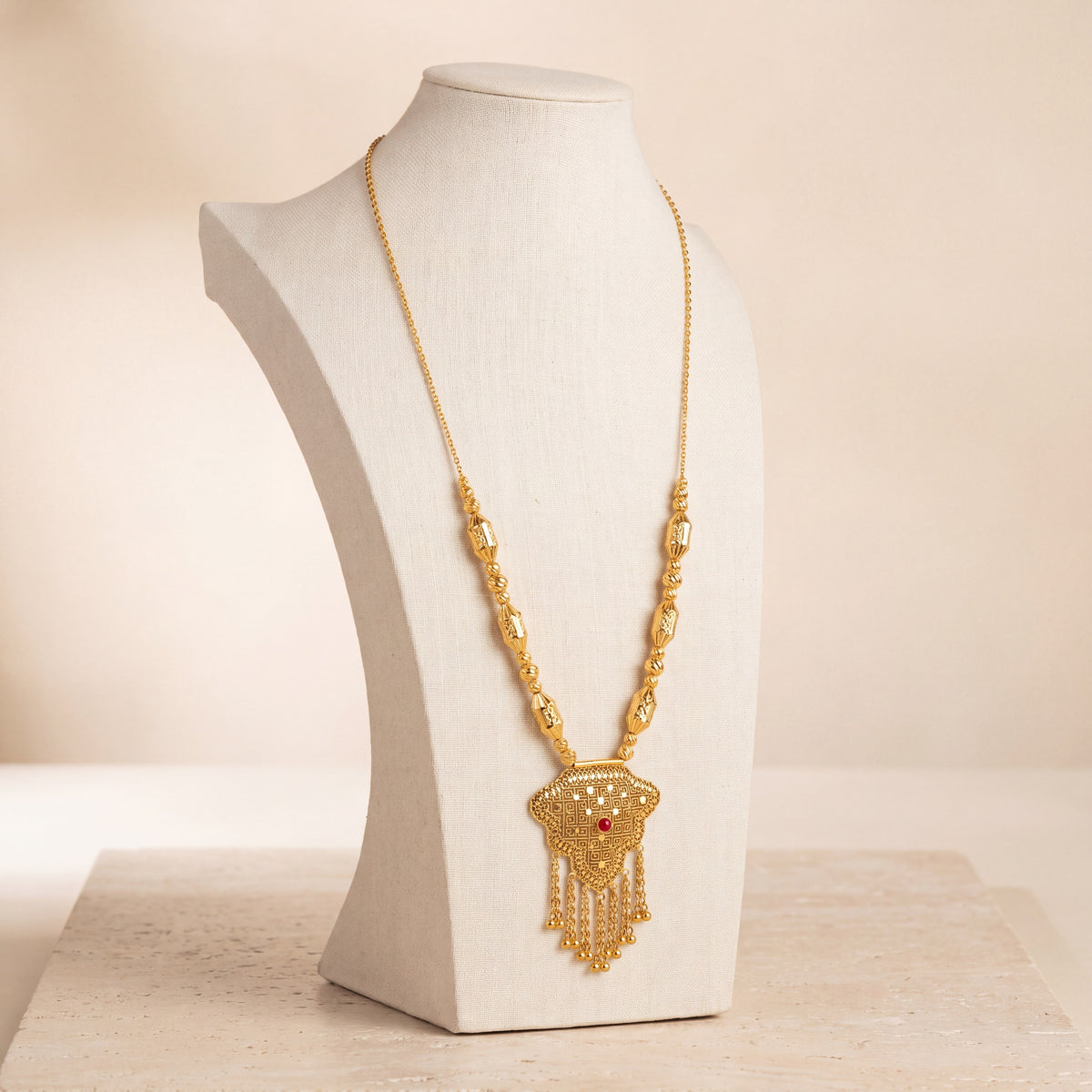 Casting Mala Necklace 9 on travertine