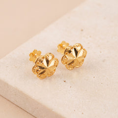 Clover Stud Earrings 2 on travertine