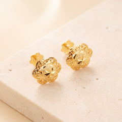 Clover Stud Earrings 3 on travertine