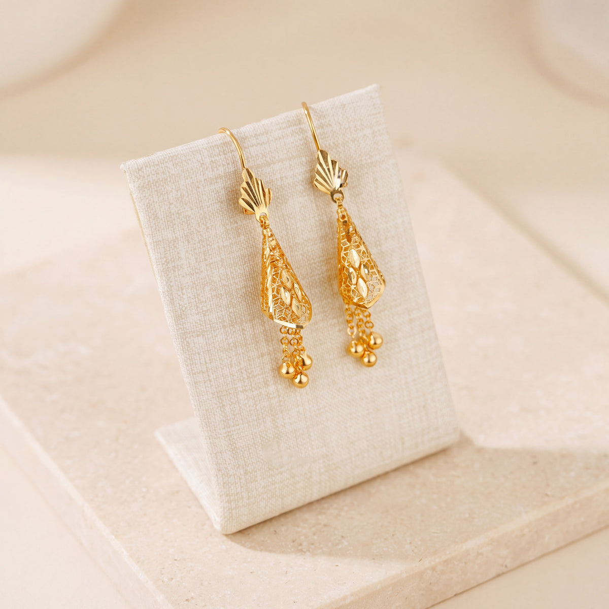 Cone Earrings 2 on travertine