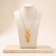 Diamond Cut Circle Mala Necklace 1 on travertine