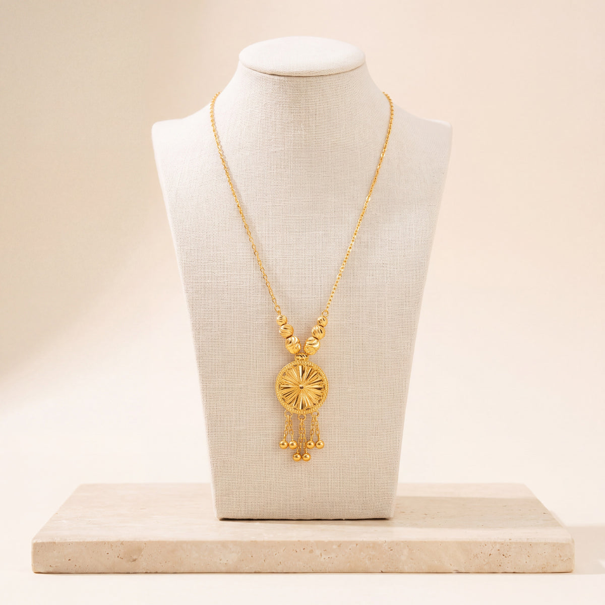 Diamond Cut Circle Mala Necklace 1 on travertine