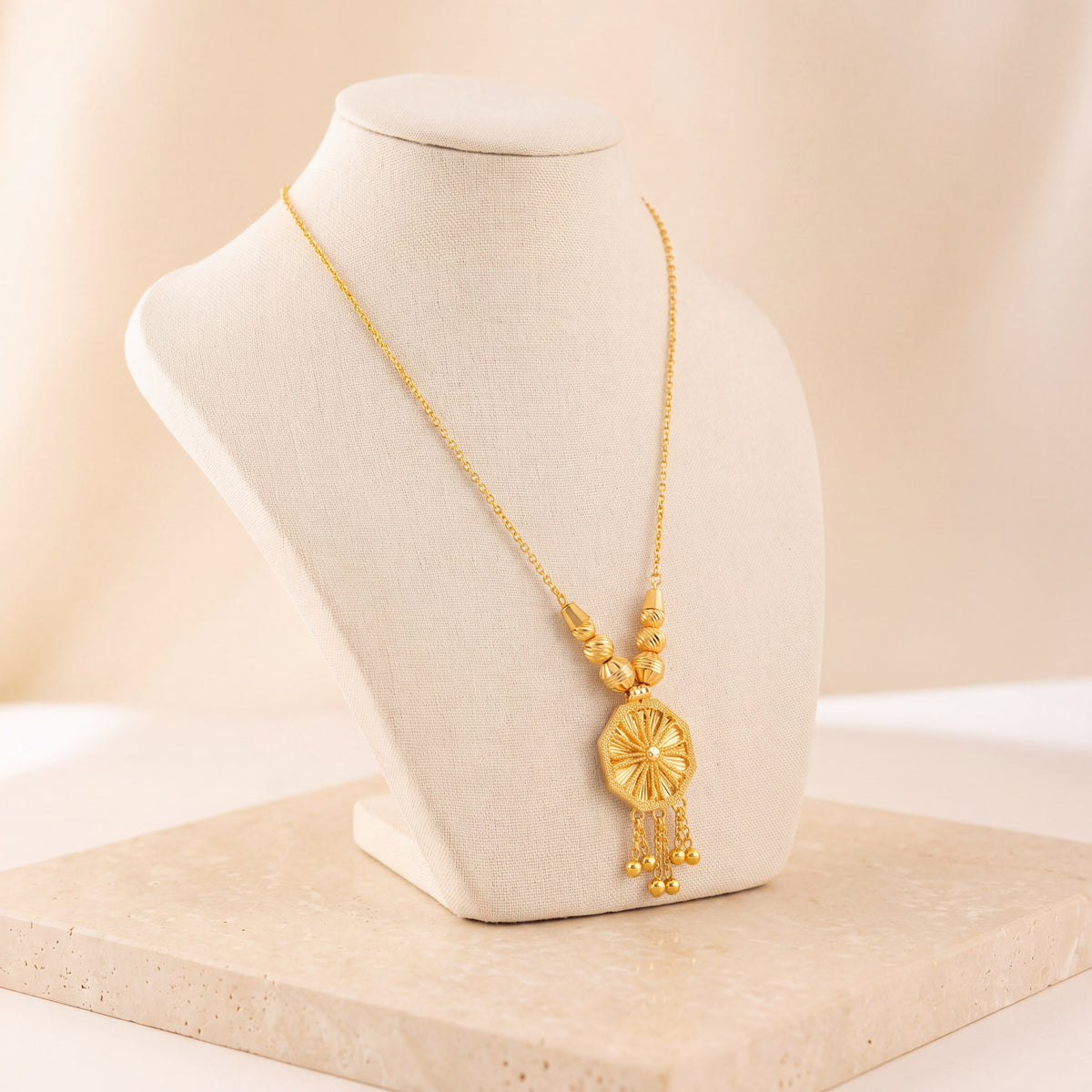 Diamond Cut Octa Mala Necklace 1 on travertine