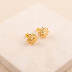 Flower Stud Earrings 12 on travertine