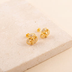 Flower Stud Earrings 30 on travertine