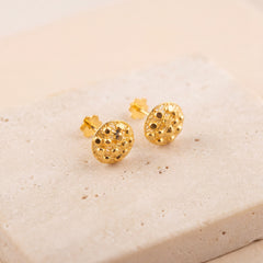 Flower Stud Earrings 5 on travertine