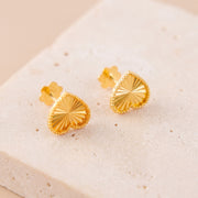 Heart Stud Earrings 5 on travertine