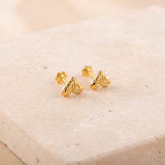 Heart Stud Earrings 6 on travertine