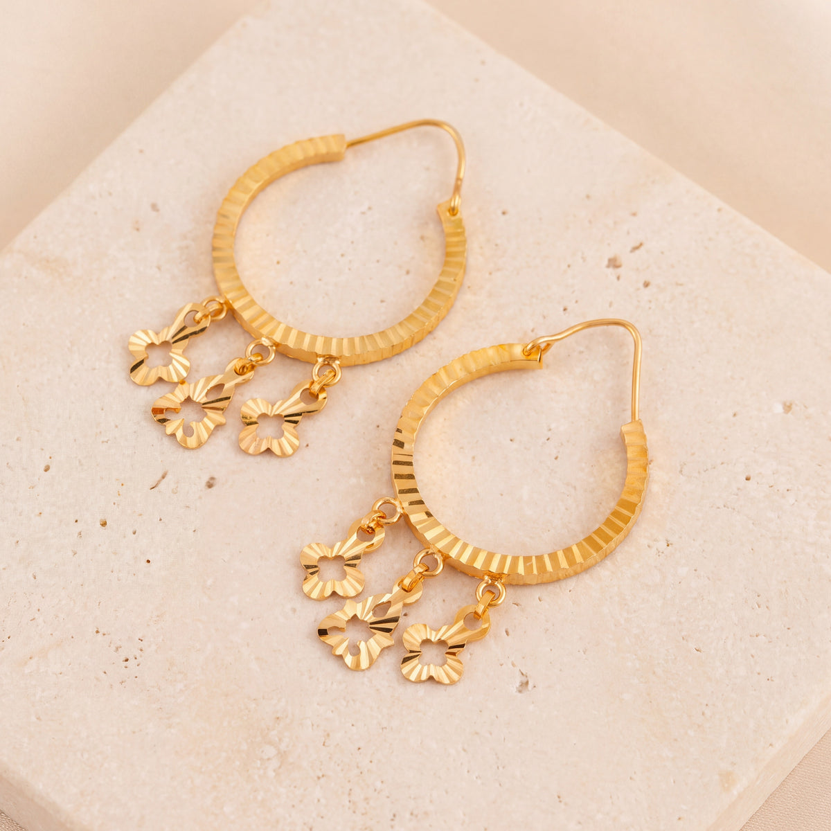 Hoop Earrings D18 - (V1) on travertine