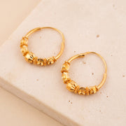 Hoop Earrings D22- (V1) on travertine