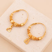 Hoop Earrings D26- (V1) on travertine