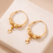 Hoop Earrings D28- (V1) on travertine