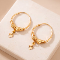 Hoop Earrings D28- (V1) on travertine