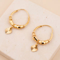 Hoop Earrings D29- (V1) on travertine