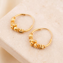 Hoop Earrings D31- (V1) on travertine
