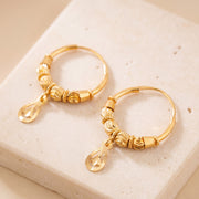 Hoop Earrings D36- (V1) on travertine