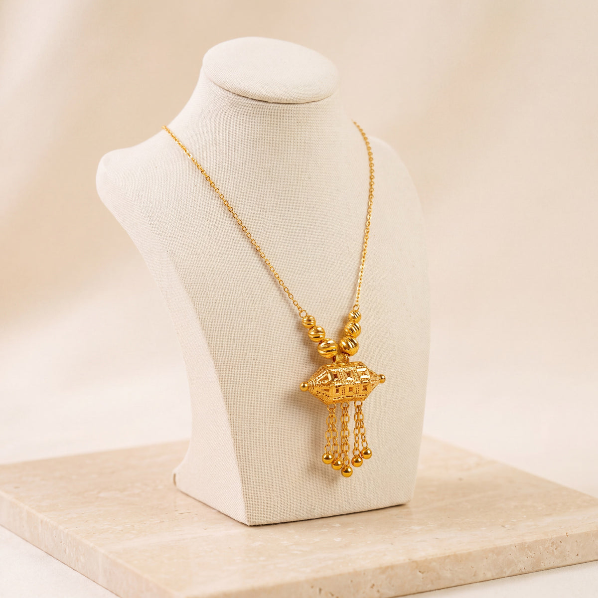 Kids Barrel Mala Necklace 18 on travertine