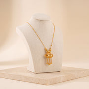 Kids Barrel Mala Necklace 32 on travertine