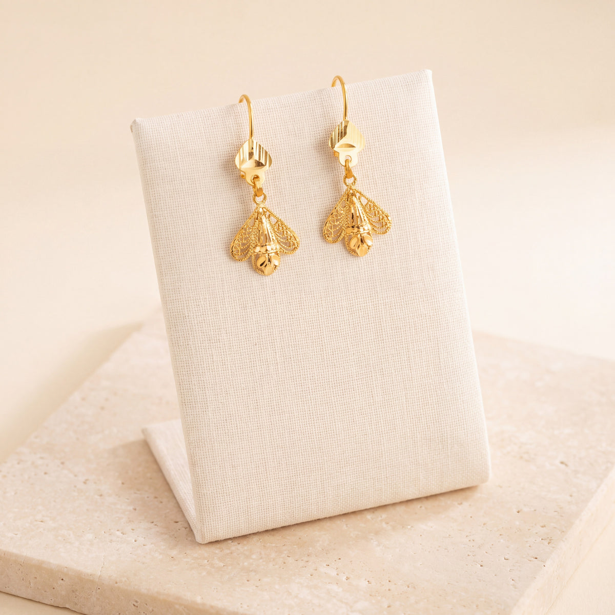 Kids Casting Earrings 1 on travertine