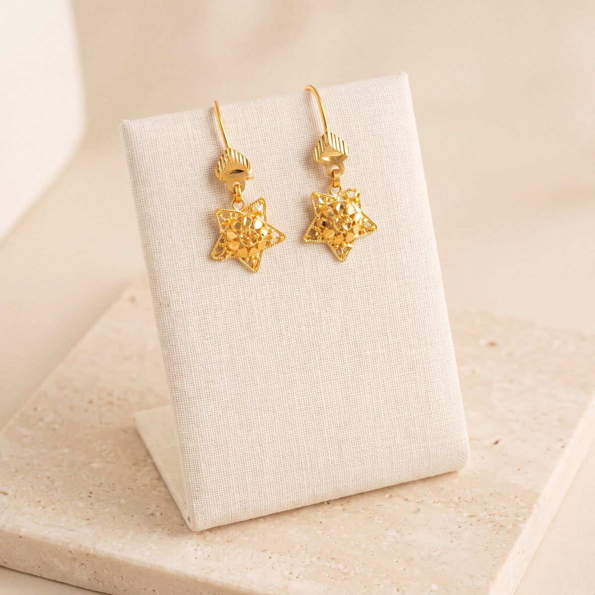 Kids Casting Earrings 2 on travertine