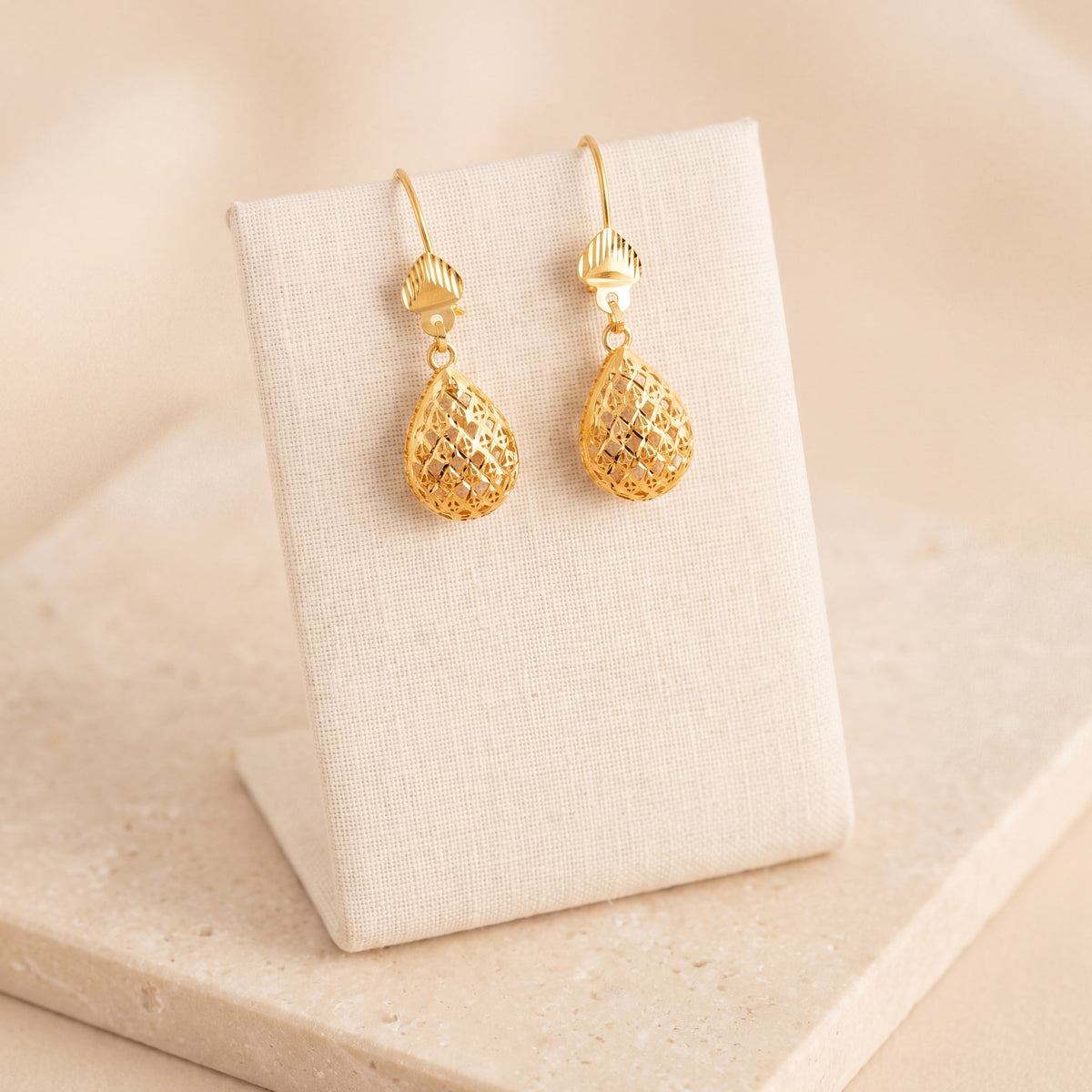 Kids Casting Earrings 28 on travertine