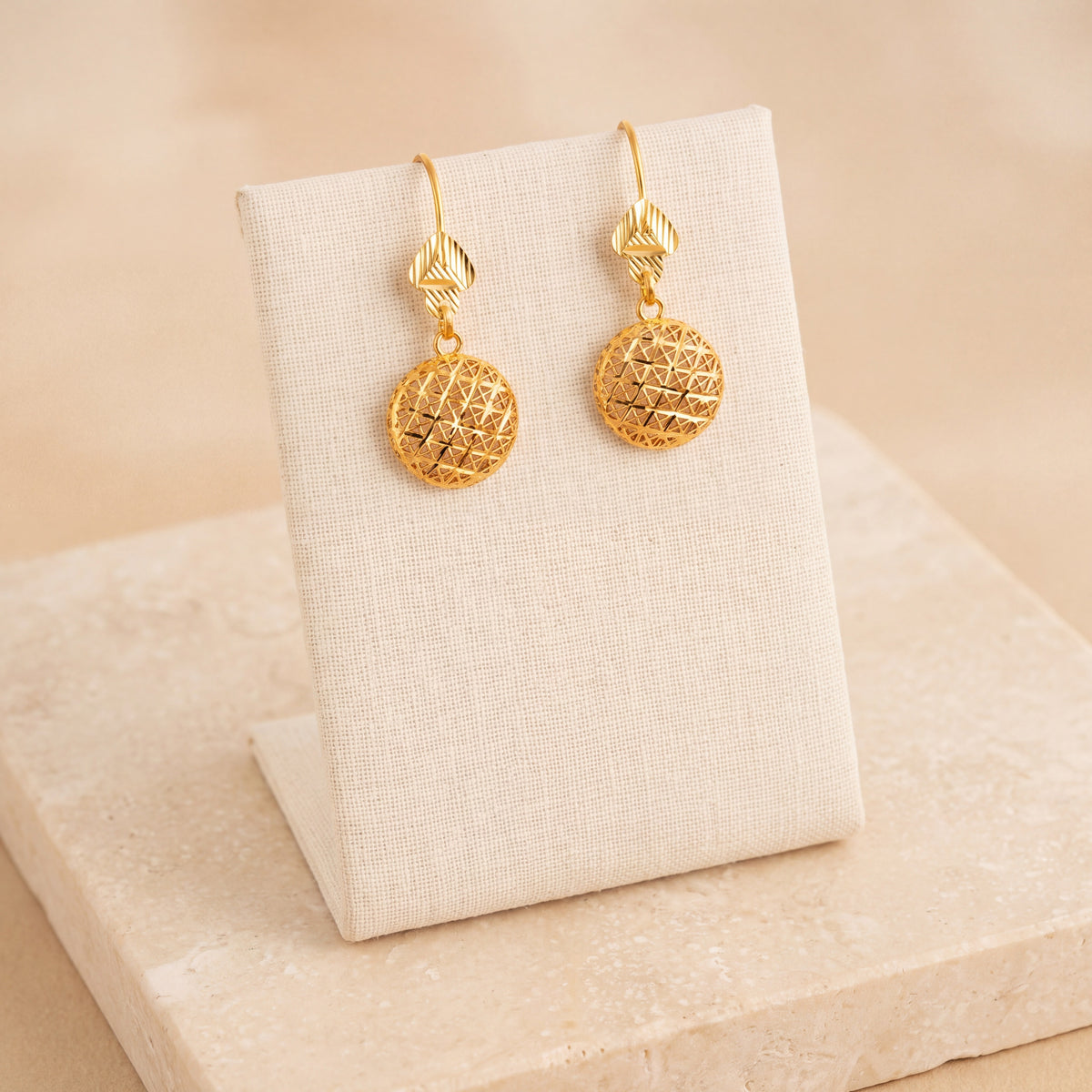 Kids Casting Earrings 29 on travertine