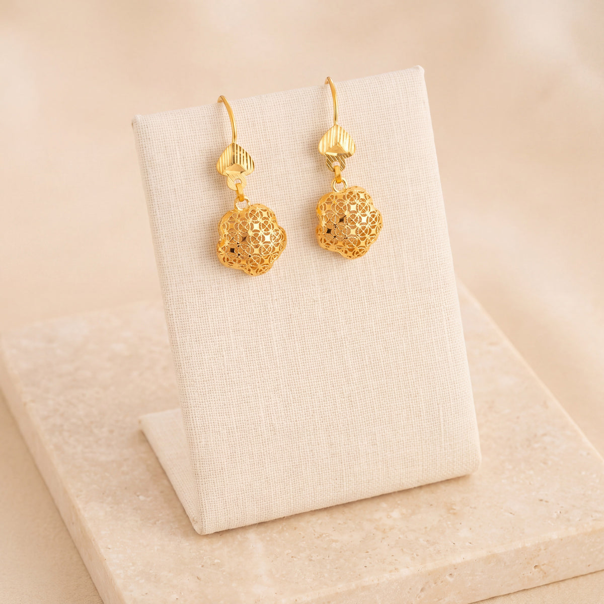 Kids Casting Earrings 30 on travertine