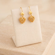 Kids Casting Earrings 33 on travertine