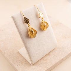 Kids Casting Earrings 34 on travertine