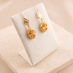 Kids Casting Earrings 35 on travertine